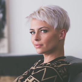 A young woman with white hair